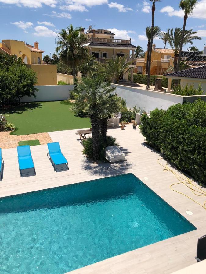 Beach Villa Playa Flamenca โอริอุเอลา ภายนอก รูปภาพ